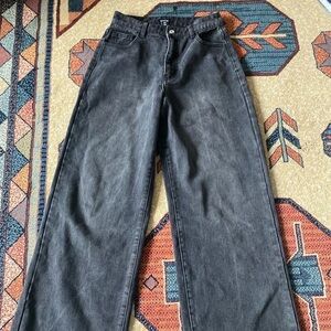 Solid Black BackgroundWide leg black jeans /size 8